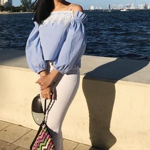 Blouse with open back and shoulder details